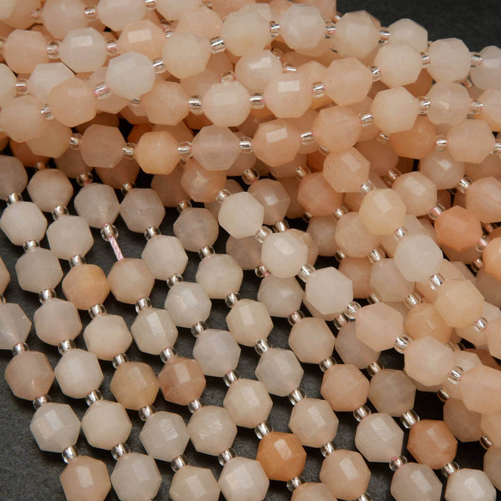 Peach aventurine faceted prism beads.