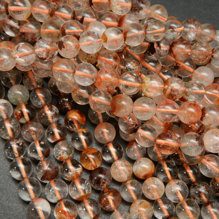 Brick red color phantom quartz beads.