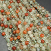Clear and red phantom quartz beads.
