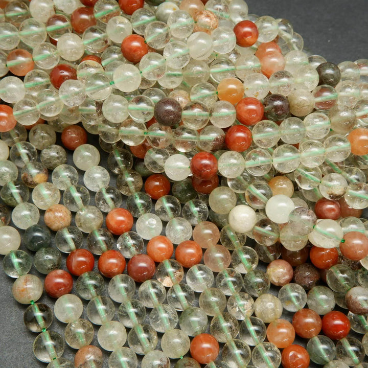 Clear and red phantom quartz beads.