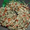 Clear and red phantom quartz beads.