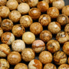 Faceted picture jasper beads.