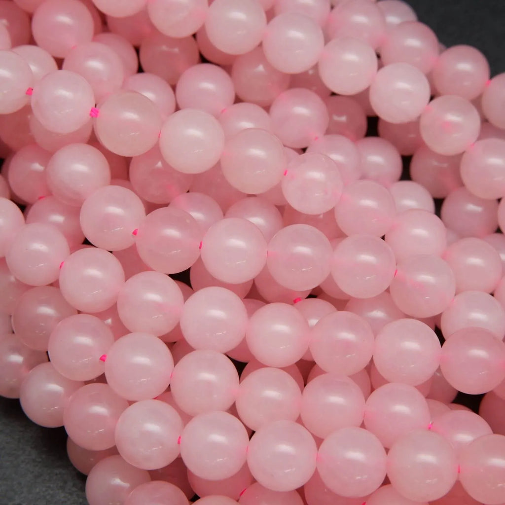 Pink polished brazilian rose quartz beads.