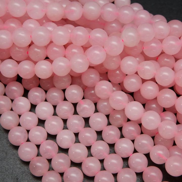 Pink polished brazilian rose quartz beads.