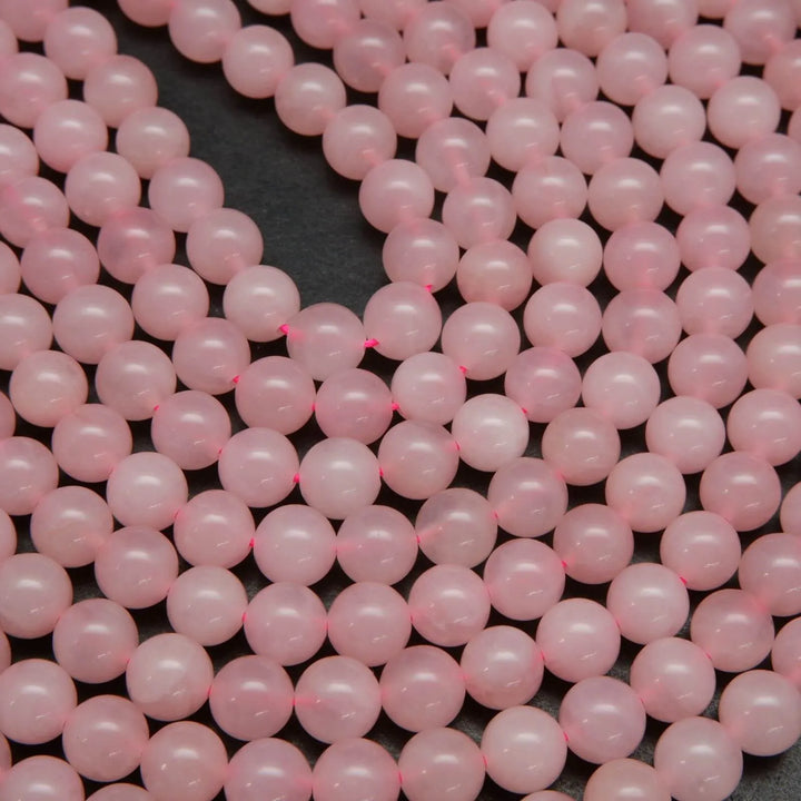 Pink polished brazilian rose quartz beads.