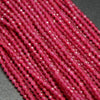 Color enhanced ruby beads.