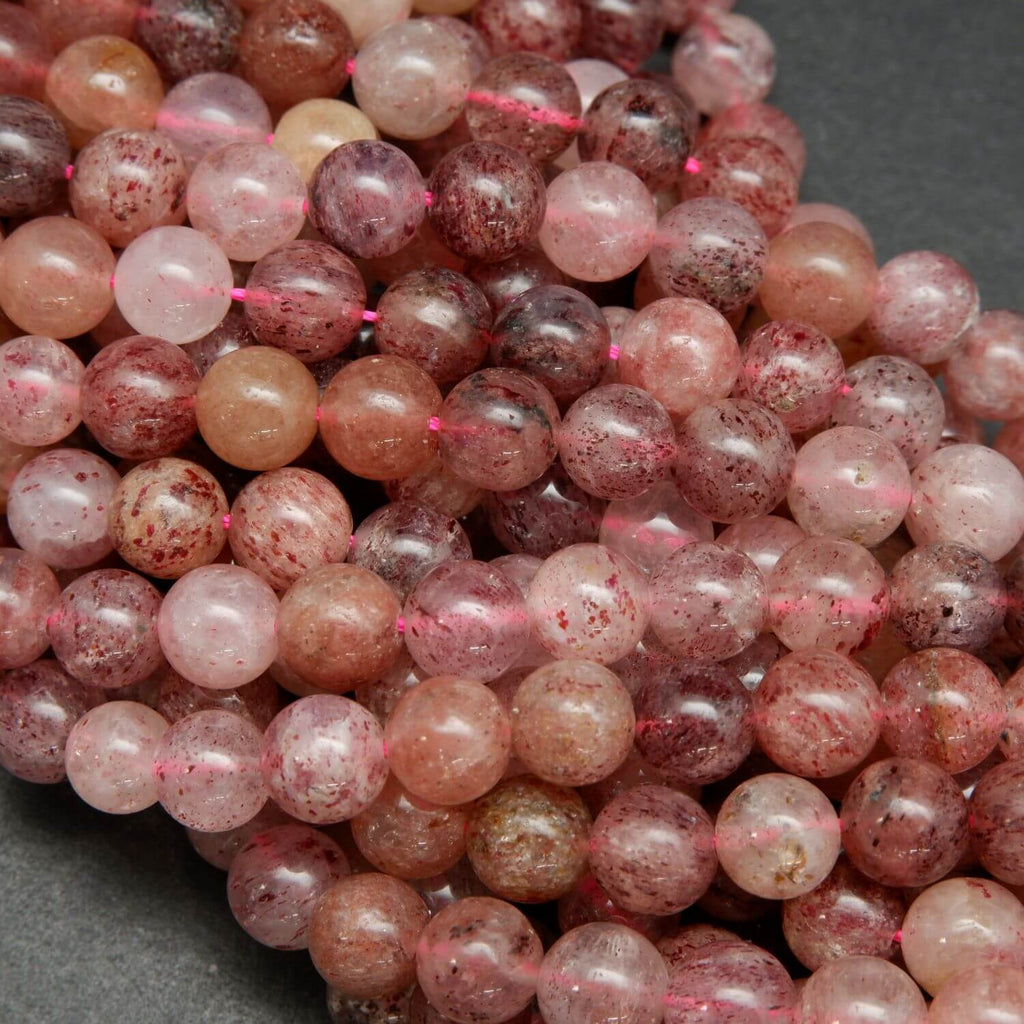 Pink spotted flake strawberry quartz beads.