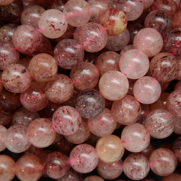 Pink spotted flake strawberry quartz beads.