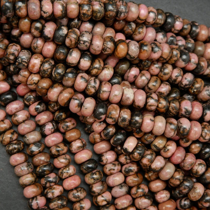 Pink rhodonite with matrix rondelle beads. Loose beads for jewelry making.