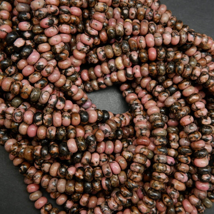 Pink rhodonite with matrix rondelle beads. Loose beads for jewelry making.