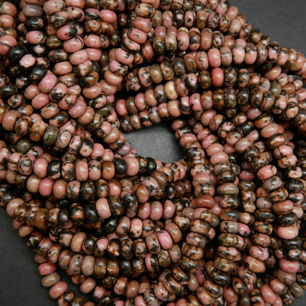 Pink rhodonite with matrix rondelle beads. Loose beads for jewelry making.