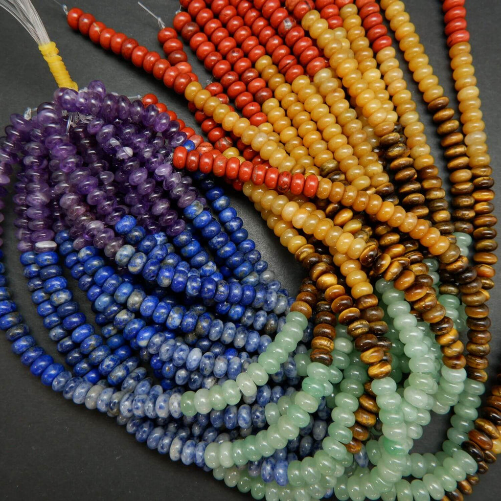 Purple, Blue, Green, Brown, Yellow, and Red Seven Chakra Rondelle Loose Beads.