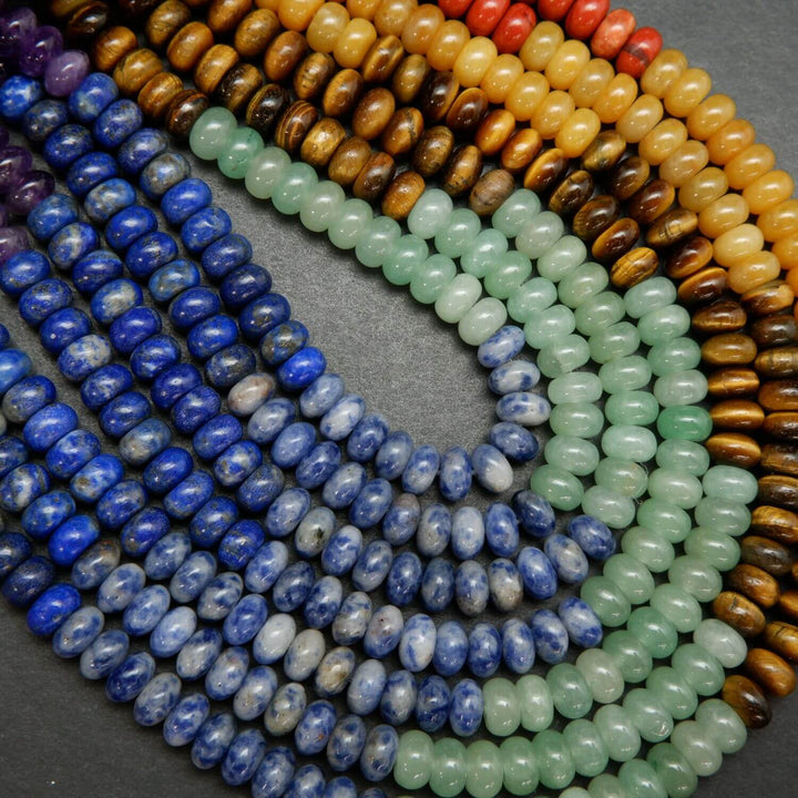 Purple, Blue, Green, Brown, Yellow, and Red Seven Chakra Rondelle Loose Beads.