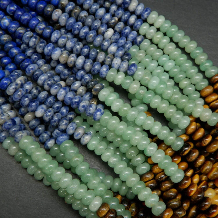 Purple, Blue, Green, Brown, Yellow, and Red Seven Chakra Rondelle Loose Beads.