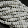 White howlite polished rondelle beads.