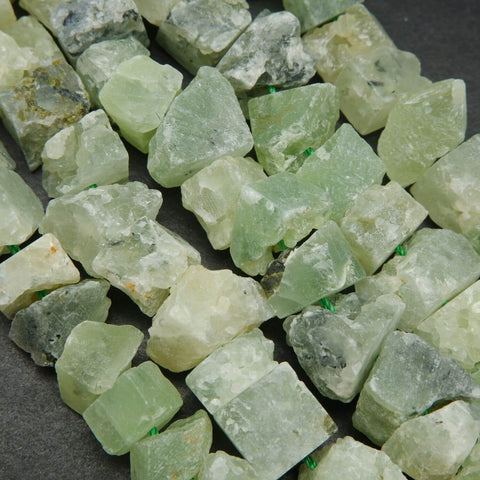 Green rough cut prehnite beads.