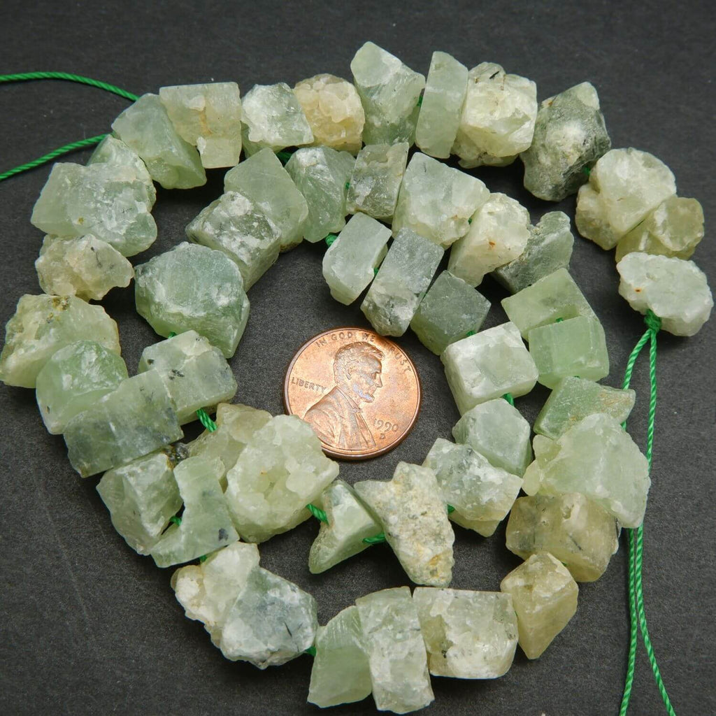 Green rough cut prehnite beads.