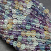 Microfaceted Yellow, Clear, Purple, and Green Fluorite Beads.
