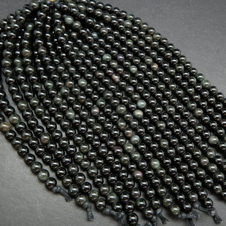 Black rainbow obsidian large hole beads.