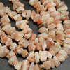 Raw cut sunstone beads.