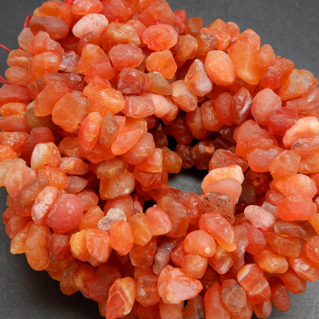 Orange carnelian agate raw freeform beads.
