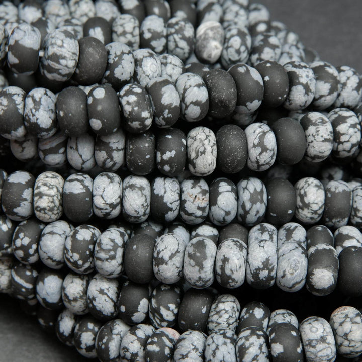 Matte finish rondelle snowflake obsidian beads.