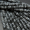 Matte finish rondelle snowflake obsidian beads.