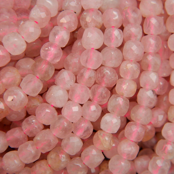 Pink cube shape rose quartz beads.