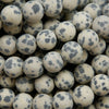 Beige to tan color matte finish Dalmatian Jasper beads. Round matte finish beads with black spots. 