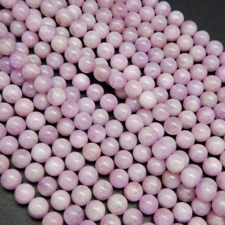 Pink and purple round kunzite beads for jewelry making