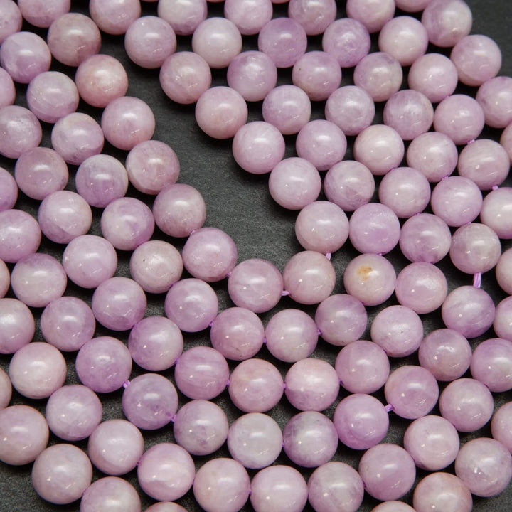 Pink and purple round kunzite beads for jewelry making