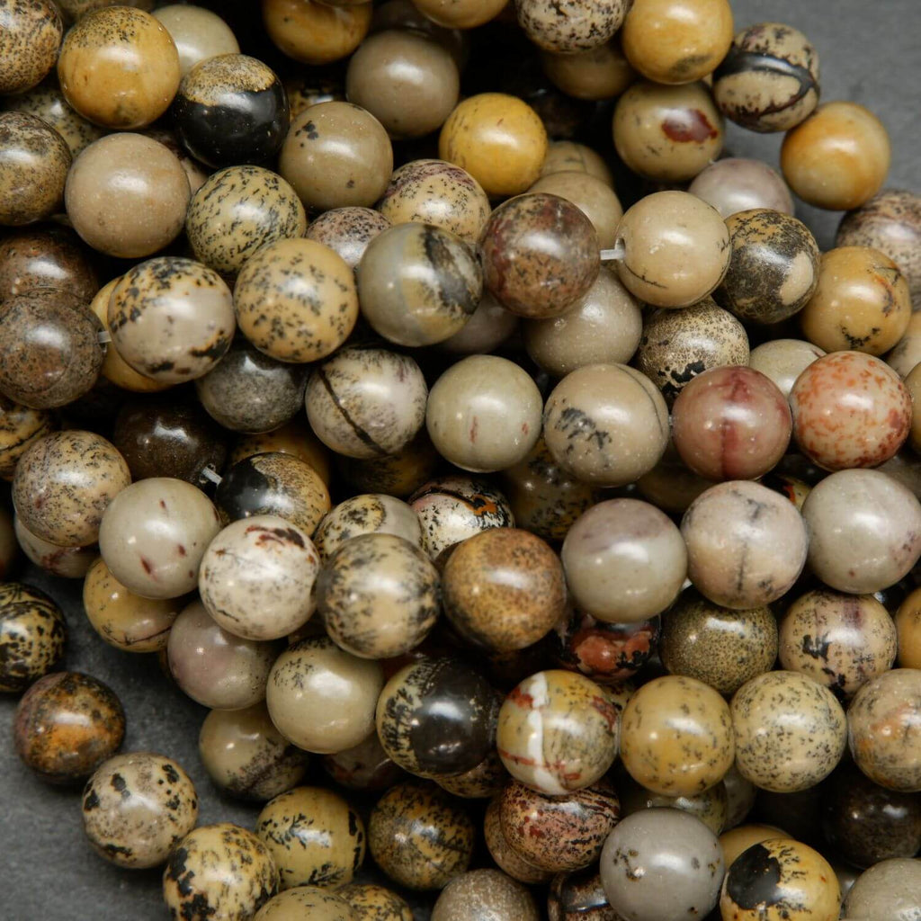 Artistic Jasper Loose Beads. Grey, yellow and beige beads round polished beads on a string.