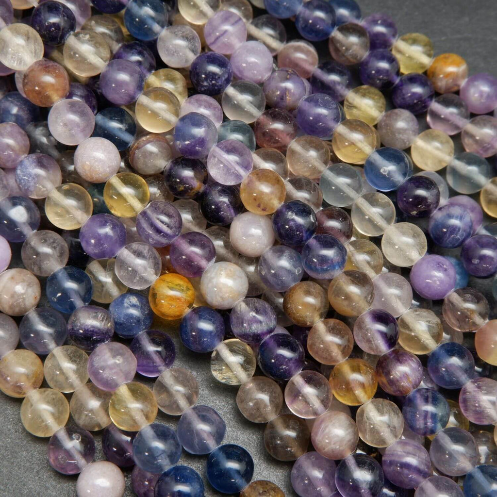 Rainbow fluorite loose beads on a string.