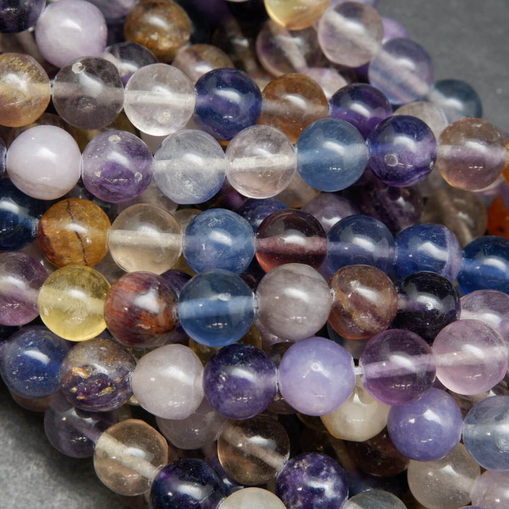Rainbow fluorite loose beads on a string.