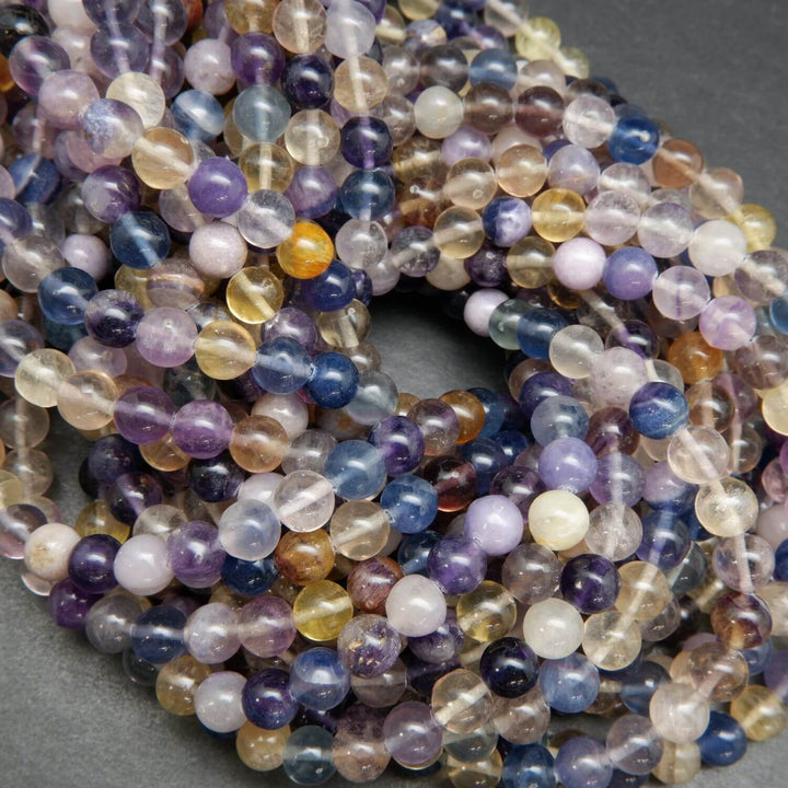 Rainbow fluorite loose beads on a string.