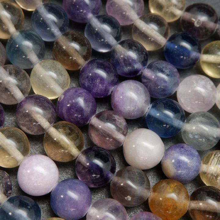 Rainbow fluorite loose beads on a string.
