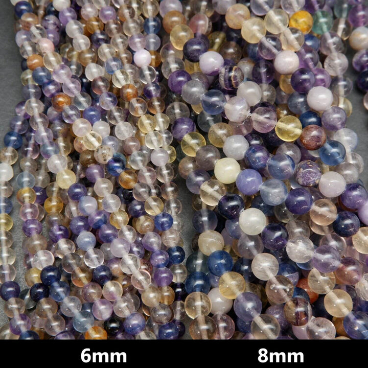 Rainbow fluorite loose beads on a string.