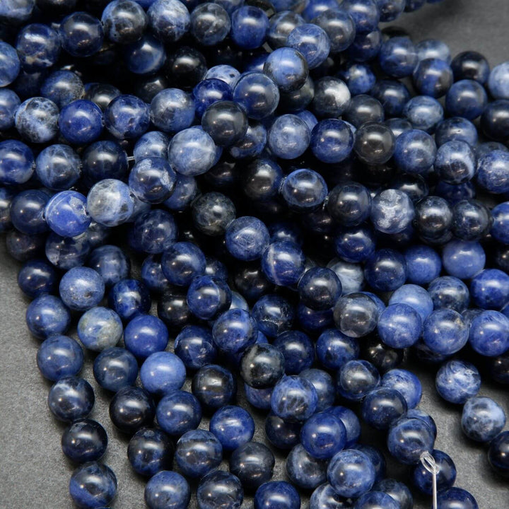 Deep blue sodalite round loose beads.