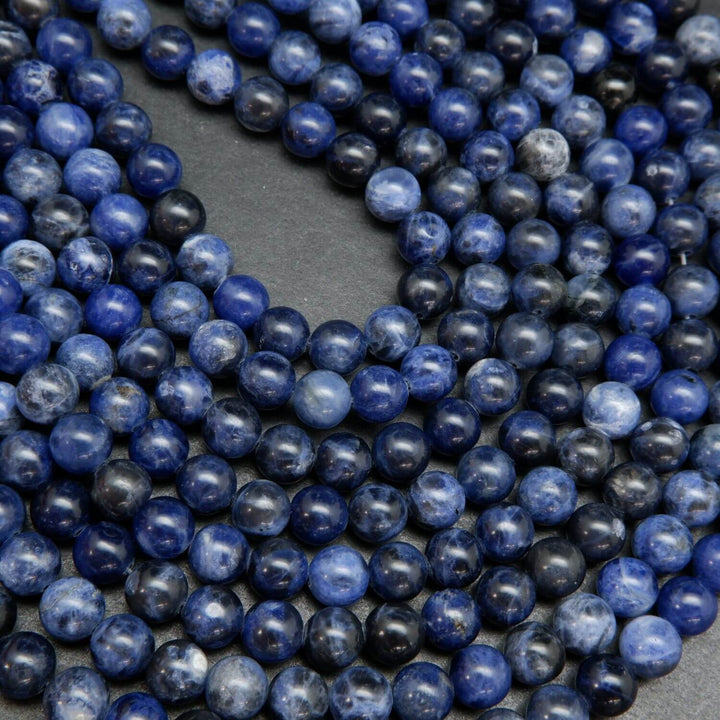 Deep blue sodalite round loose beads.