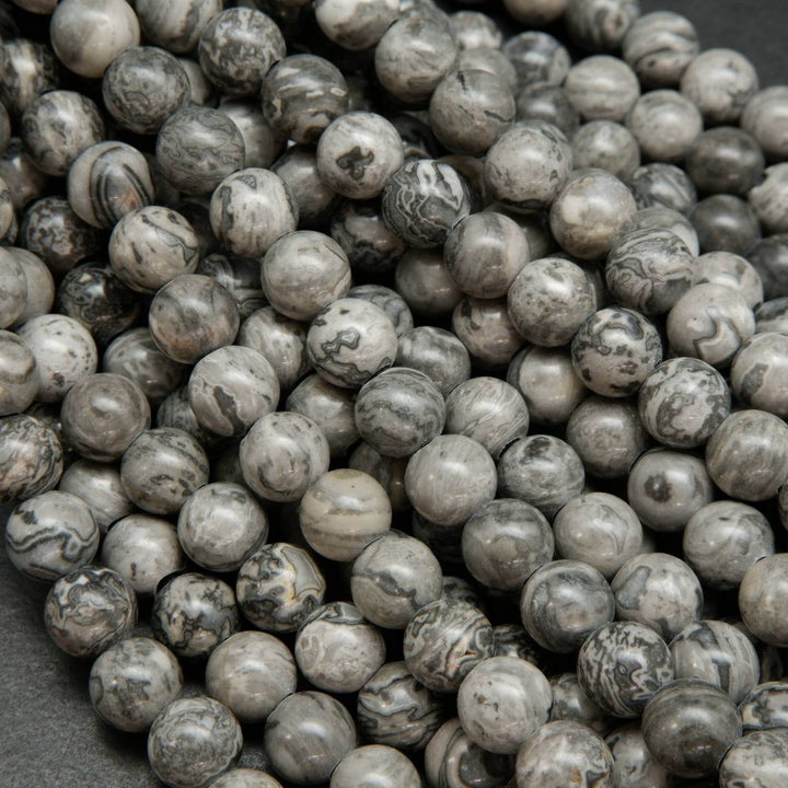 Large Hole Silver Crazy Lace Agate Beads. Silver round beads with a curvy patterning.