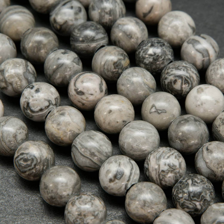 Large Hole Silver Crazy Lace Agate Beads. Silver round beads with a curvy patterning.