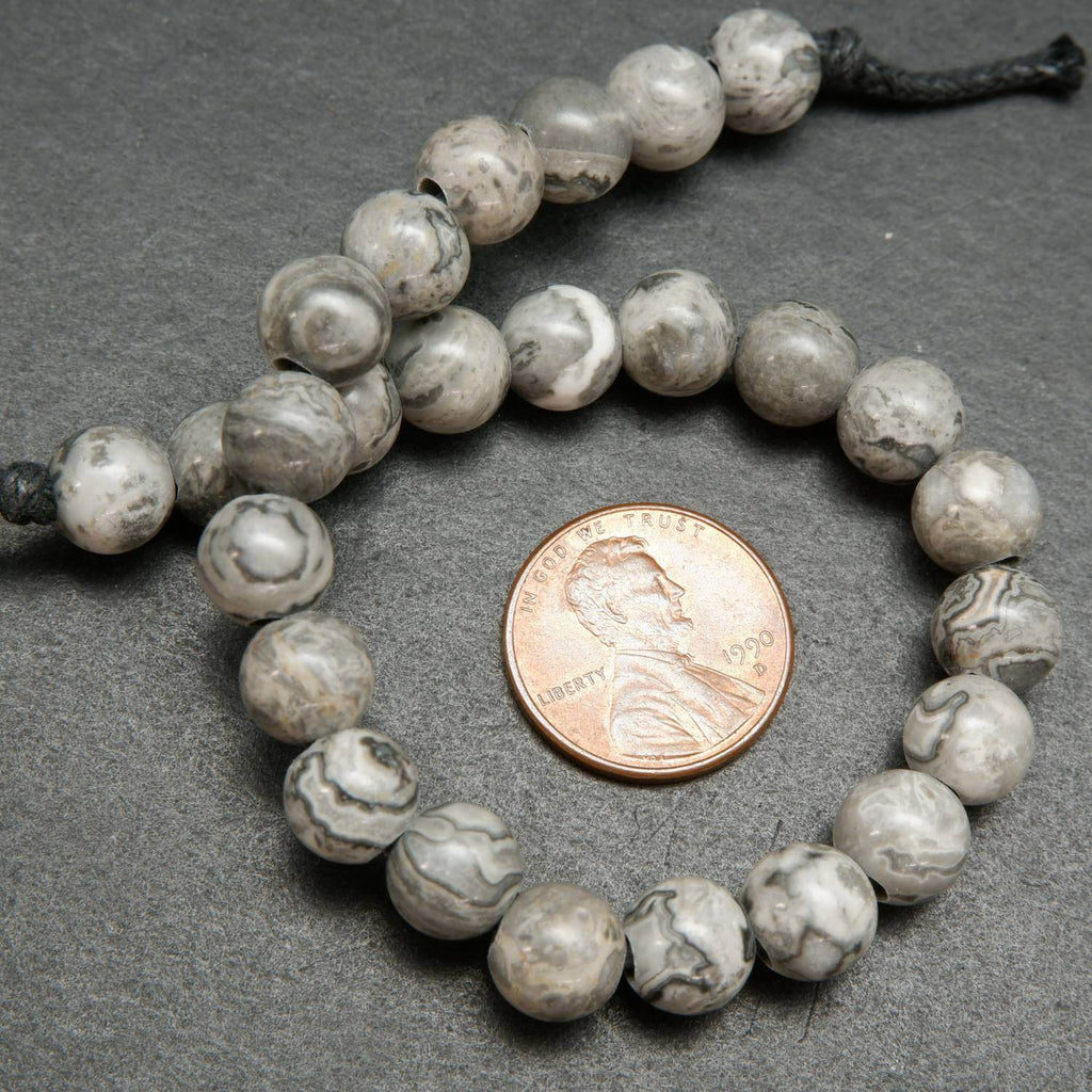 Large Hole Silver Crazy Lace Agate Beads. Silver round beads with a curvy patterning.
