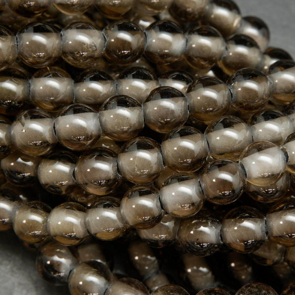 Brown translucent smoky quartz large hole beads.