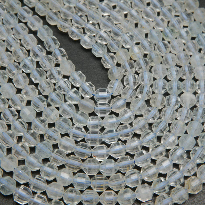 Clear topaz prism shape beads.