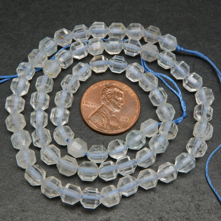 Clear topaz prism shape beads.