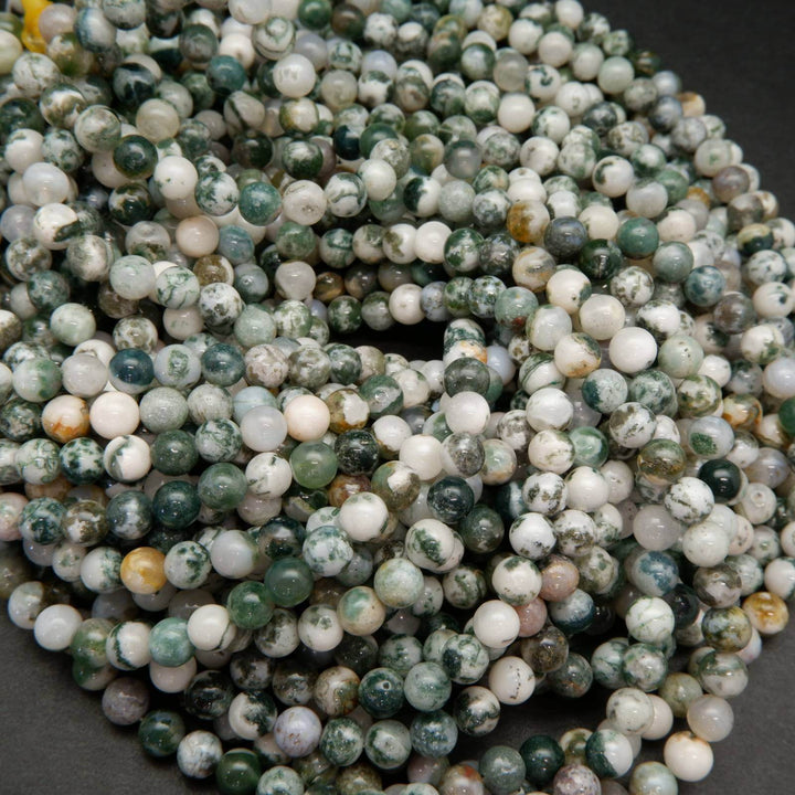 Green and white tree moss agate beads.