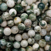 Green and white tree moss agate beads.