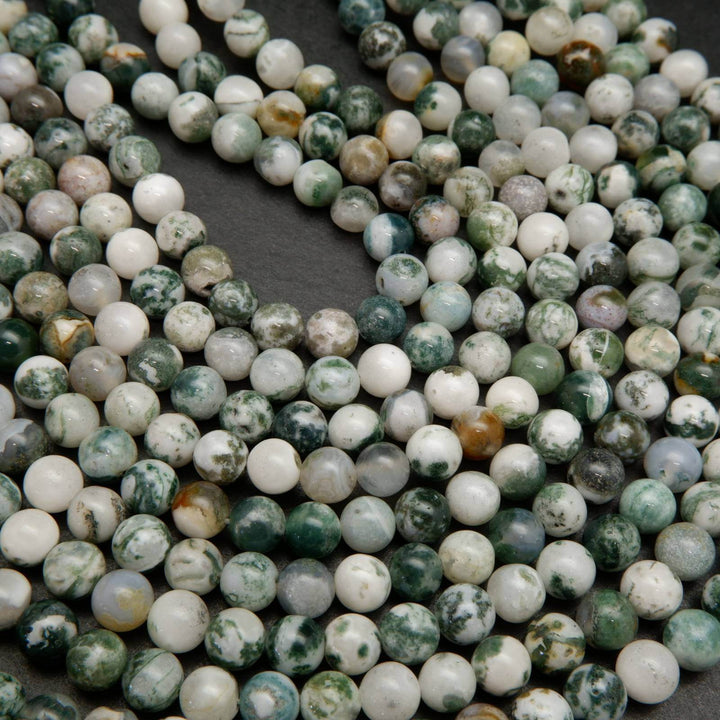 Green and white tree moss agate beads.