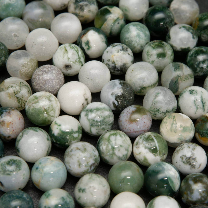 Green and white tree moss agate beads.