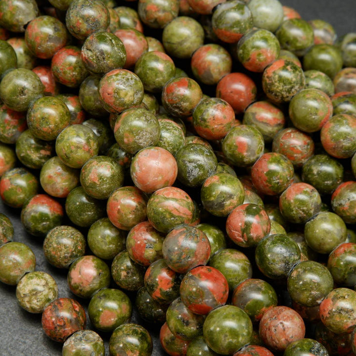Drab green and pinkish orange unakite large hole beads.